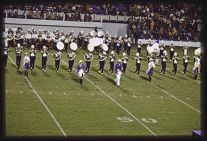 Photograph of the ECU marching band during the 1976 Homecoming football game.